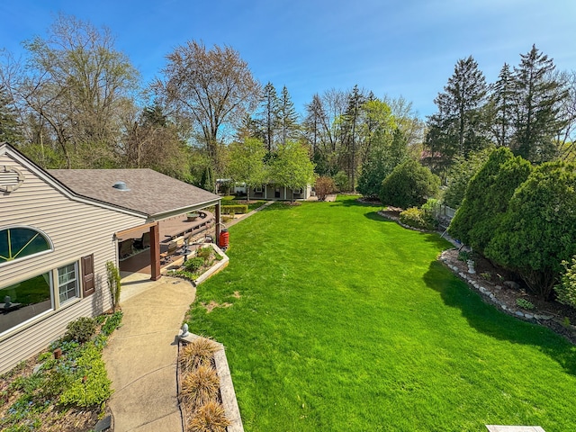 view of yard with a patio area and fence