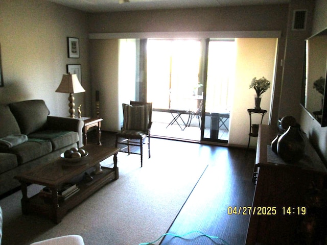 21800 Morley Ave Unit 403, Dearborn, MI 48124 - living area featuring visible vents and wood finished floors