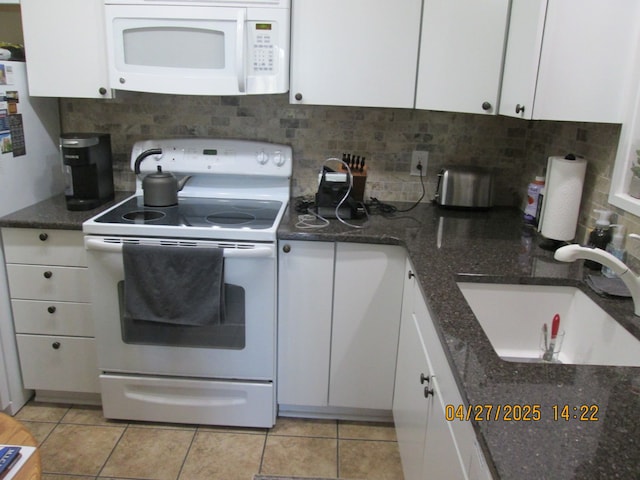 21800 Morley Ave Unit 403, Dearborn, MI 48124 - kitchen featuring white cabinetry, white appliances, backsplash, and a sink