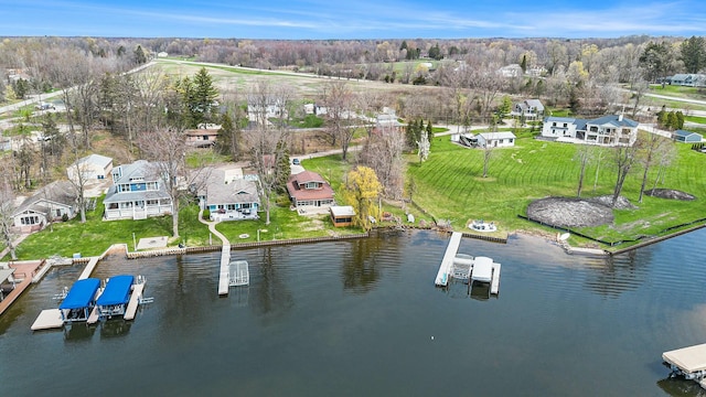 bird's eye view with a water view and a residential view