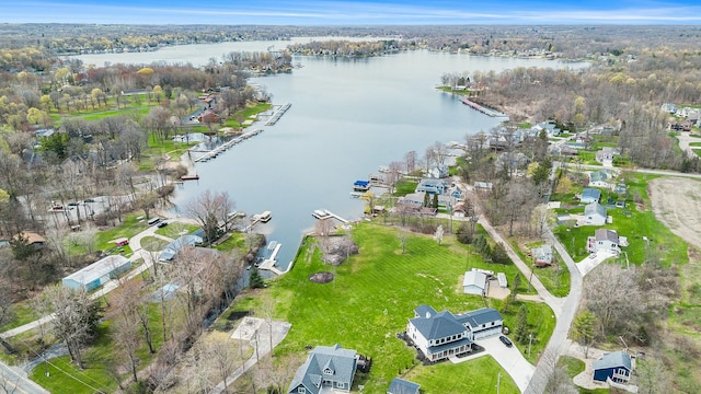 aerial view featuring a water view and a residential view