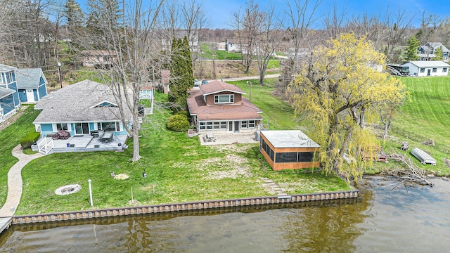 bird's eye view with a water view