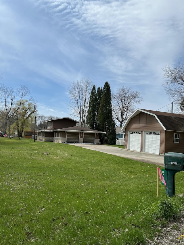 exterior space with a garage and an outdoor structure