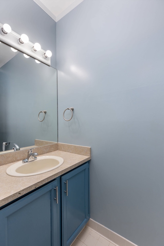 30701 Sandalwood Cir, Novi, MI 48377 - bathroom with tile patterned floors, baseboards, ornamental molding, and vanity