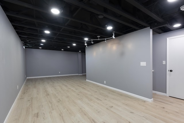 30701 Sandalwood Cir, Novi, MI 48377 - finished basement featuring wood finished floors and baseboards