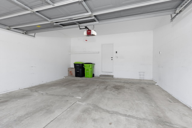 30701 Sandalwood Cir, Novi, MI 48377 - garage featuring a garage door opener
