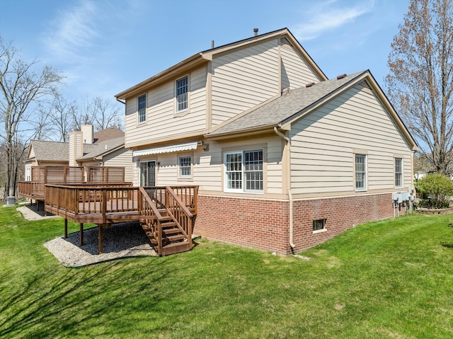 30701 Sandalwood Cir, Novi, MI 48377 - rear view of property with brick siding, a wooden deck, a shingled roof, and a lawn