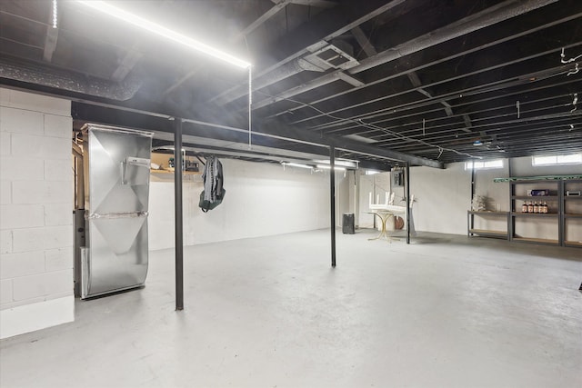 below grade area featuring heating unit