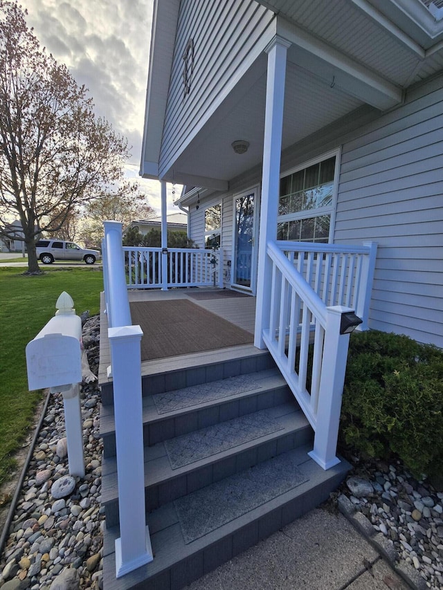 609 1st St, Lake Odessa, MI 48849 - exterior space featuring a porch