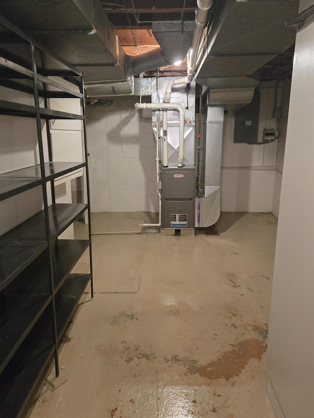 609 1st St, Lake Odessa, MI 48849 - unfinished basement with heating unit