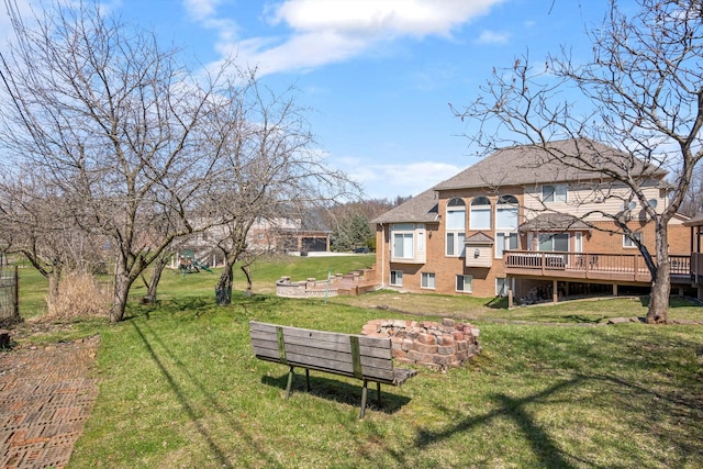 view of yard featuring a deck