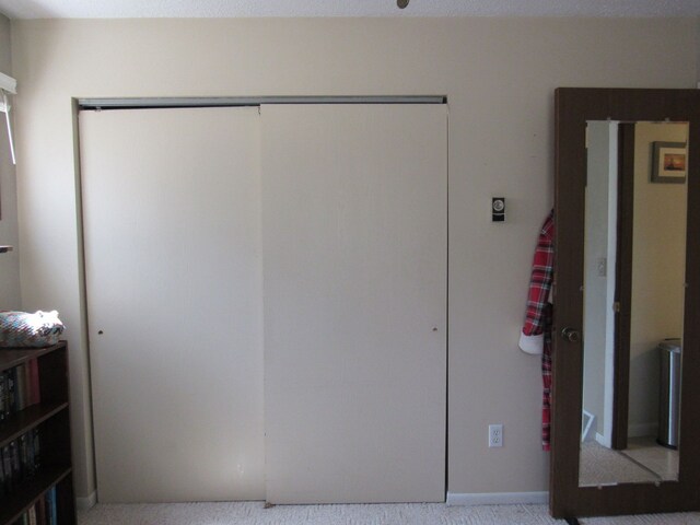 117 Vista Ct, Roscommon, MI 48653 - bedroom with a closet and carpet flooring