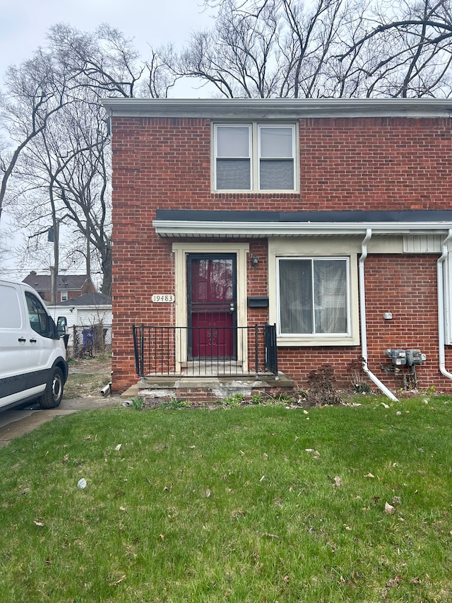 19483 Meyers Rd, Detroit, MI 48235 - multi unit property featuring brick siding and a front lawn