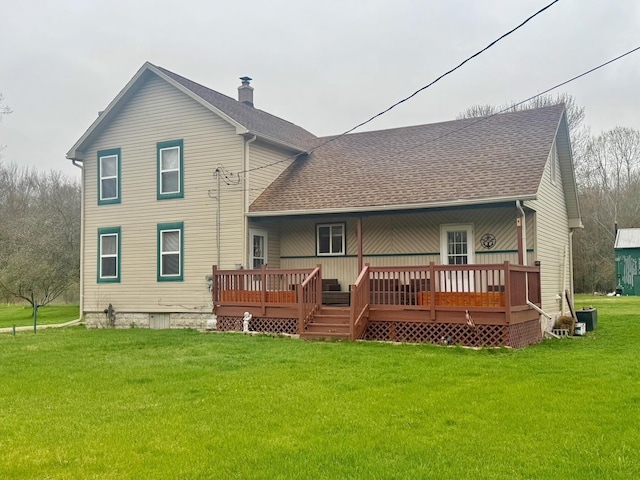 7850 Marsh Rd, Marine City, MI 48039 - rear view of property featuring a chimney, a deck, a yard, and a shingled roof