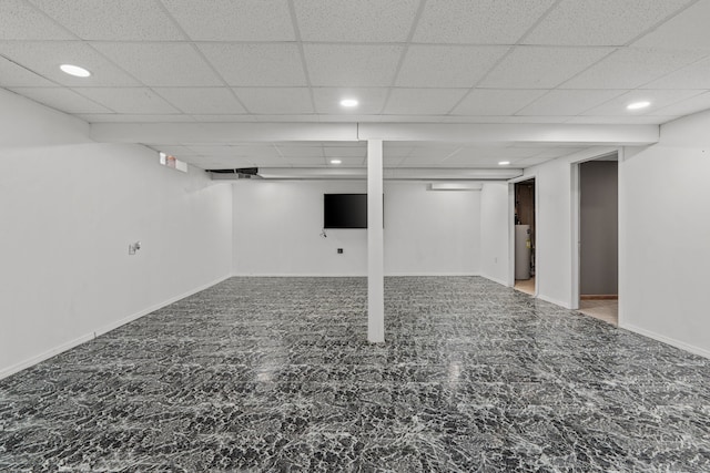 25820 Lord Dr, Chesterfield, MI 48051 - finished below grade area featuring baseboards, recessed lighting, water heater, and a paneled ceiling