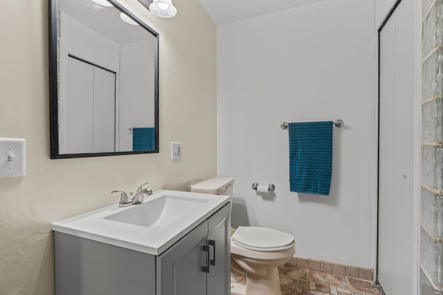 25820 Lord Dr, Chesterfield, MI 48051 - bathroom with toilet, vanity, and stone finish flooring