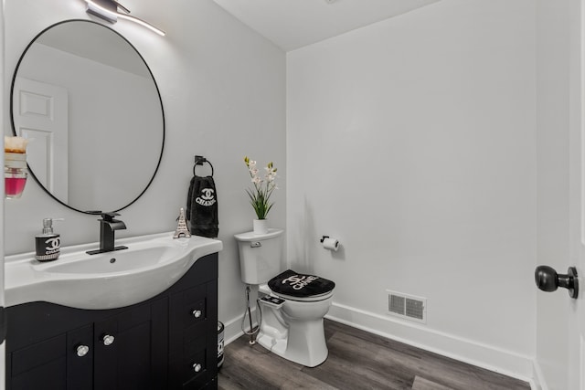 25820 Lord Dr, Chesterfield, MI 48051 - bathroom featuring baseboards, visible vents, wood finished floors, and vanity