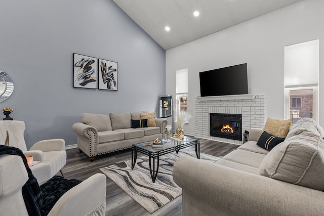 25820 Lord Dr, Chesterfield, MI 48051 - living area featuring recessed lighting, wood finished floors, a fireplace, baseboards, and high vaulted ceiling