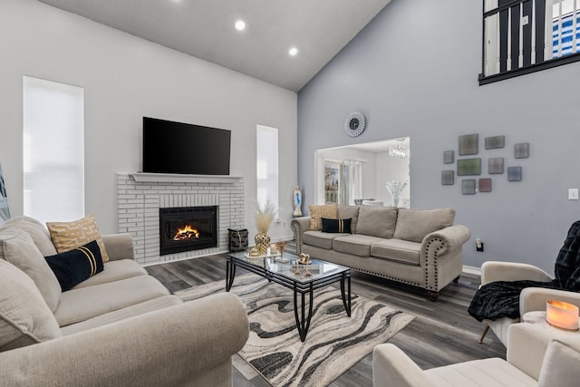 25820 Lord Dr, Chesterfield, MI 48051 - living room with recessed lighting, wood finished floors, a fireplace, baseboards, and high vaulted ceiling