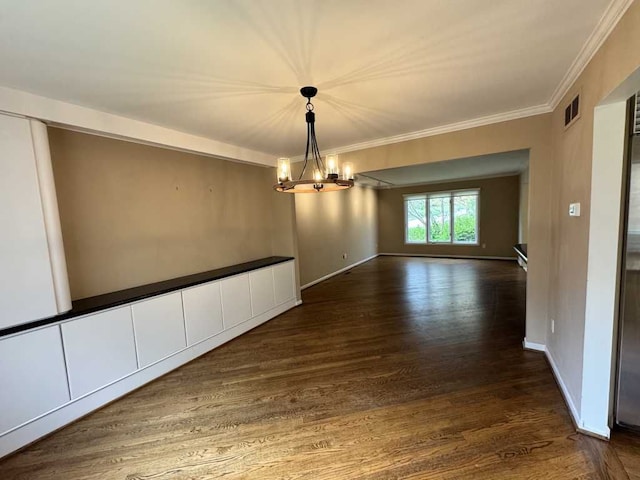 35315 Regency Ln, Farmington Hills, MI 48331 - empty room with a chandelier, dark wood-style flooring, ornamental molding, and baseboards