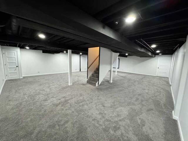 35315 Regency Ln, Farmington Hills, MI 48331 - finished basement featuring stairs, carpet, and baseboards