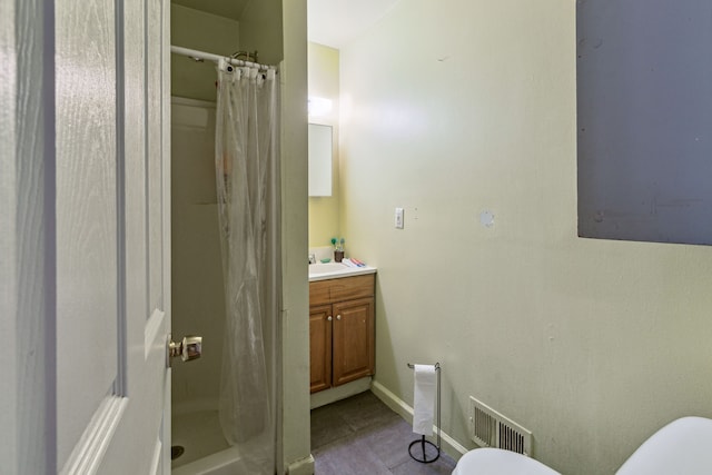 2602 Gratiot Ave, Port Huron, MI 48060 - full bathroom with a shower stall, vanity, tile patterned floors, toilet, and visible vents