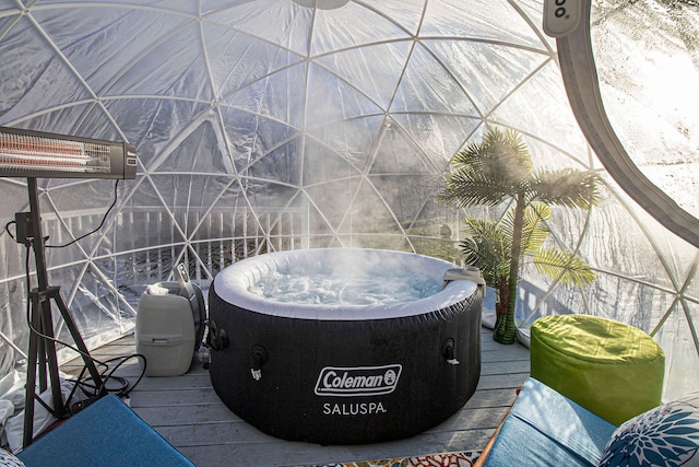 exterior details featuring a jacuzzi