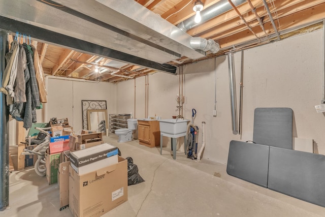 unfinished basement with a sink
