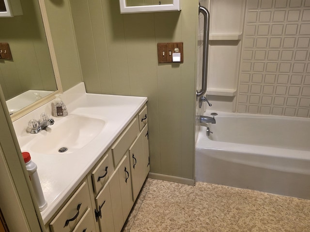full bathroom featuring vanity and  shower combination