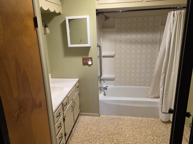 bathroom featuring vanity and shower / bath combination with curtain
