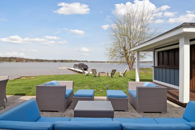 view of patio / terrace featuring a water view and outdoor lounge area
