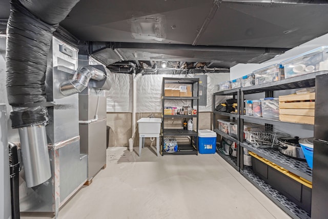 storage room featuring heating unit