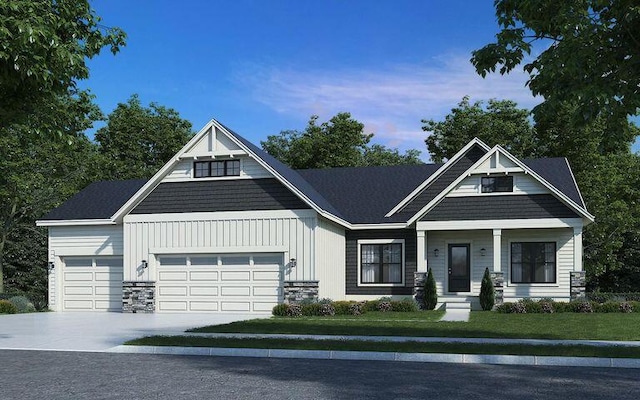 craftsman inspired home with a front lawn, stone siding, an attached garage, and concrete driveway