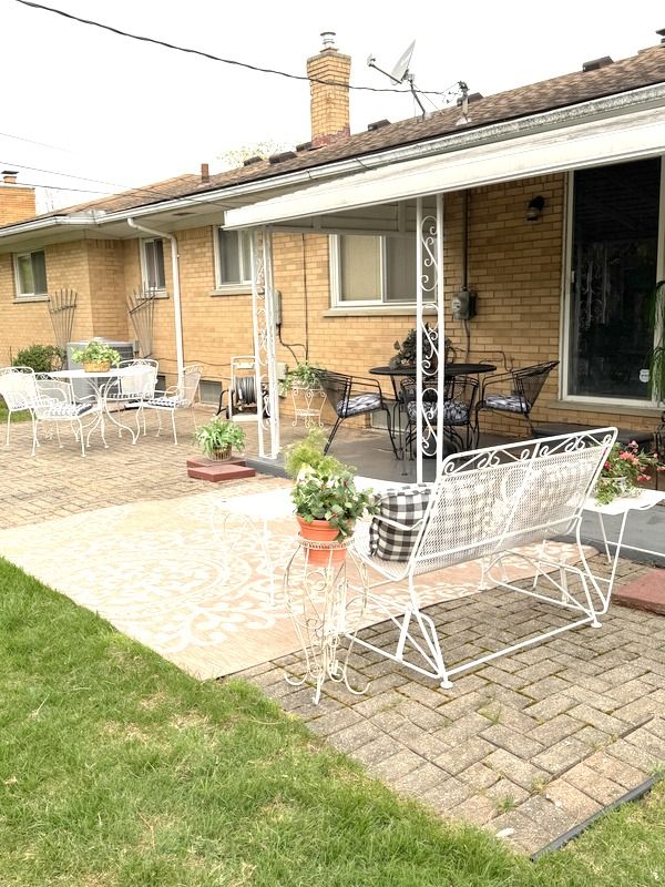 18337 Greenwald Dr, Southfield, MI 48075 - rear view of property with brick siding, a chimney, and a patio area