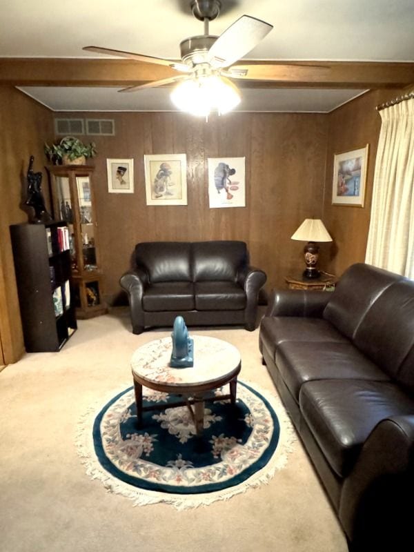 18337 Greenwald Dr, Southfield, MI 48075 - living room featuring visible vents, carpet, ceiling fan, and wooden walls