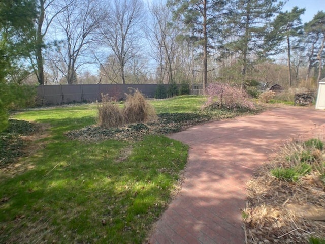 68 Davis Dr, Saginaw, MI 48602 - view of yard featuring fence