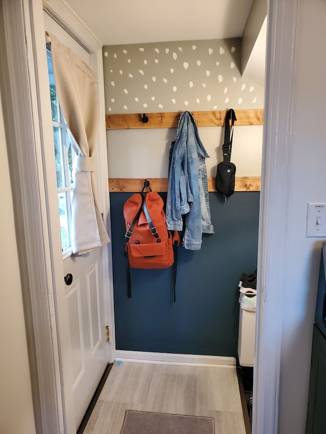 mudroom with wood finished floors