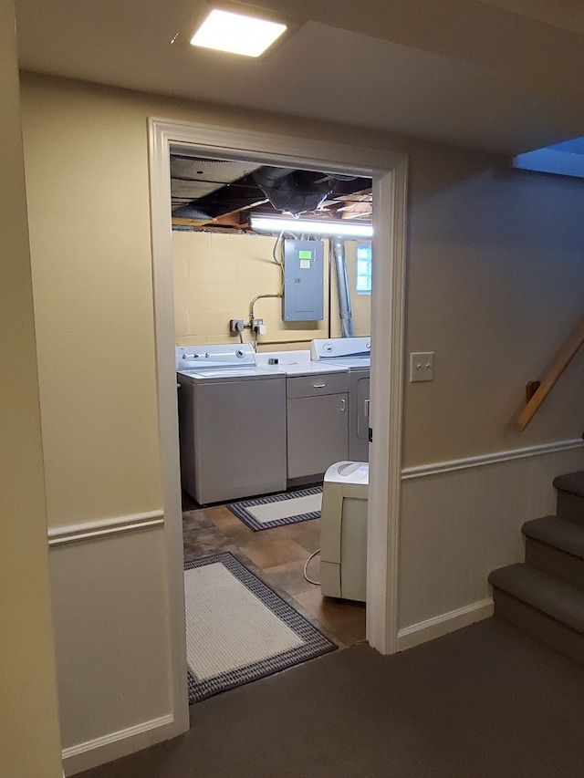 interior space featuring washer and dryer, carpet flooring, and electric panel