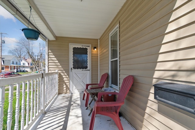 701 N Saginaw St, Durand, MI 48429 - balcony with covered porch