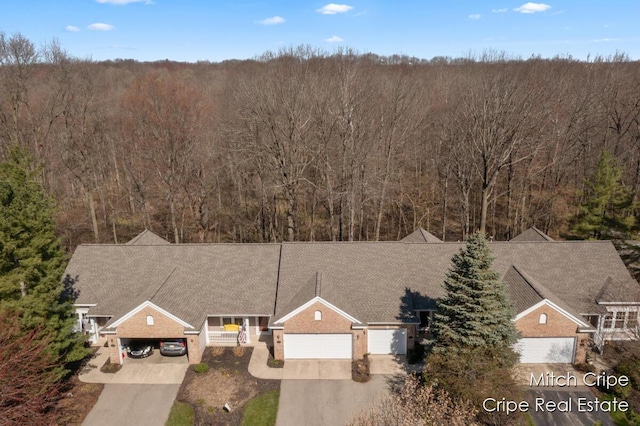 aerial view featuring a view of trees