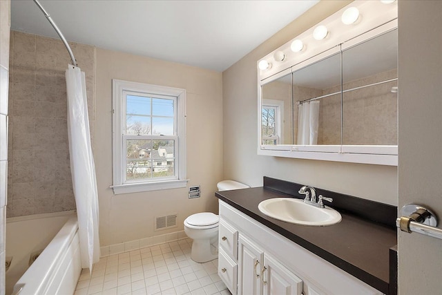 full bath featuring vanity, toilet, visible vents, baseboards, and tile patterned flooring