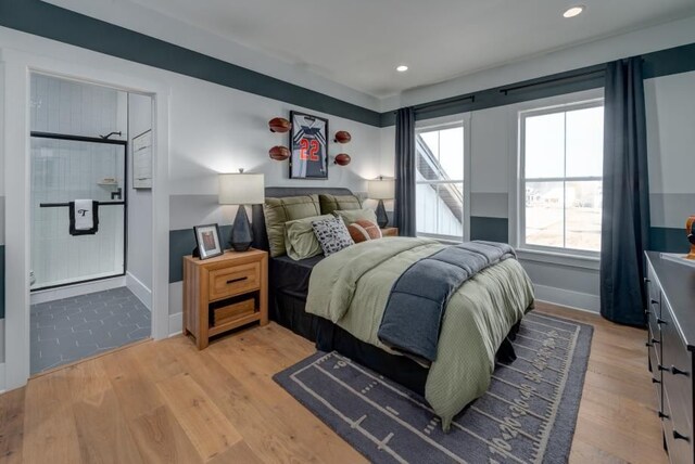 bedroom with recessed lighting, baseboards, and light wood-type flooring