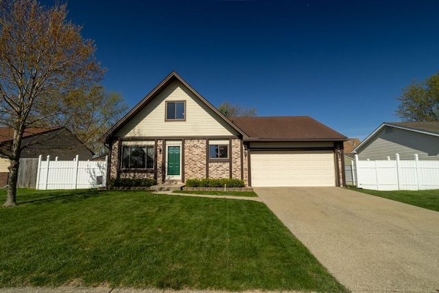 view of front of house with a front lawn, driveway, a garage, and fence