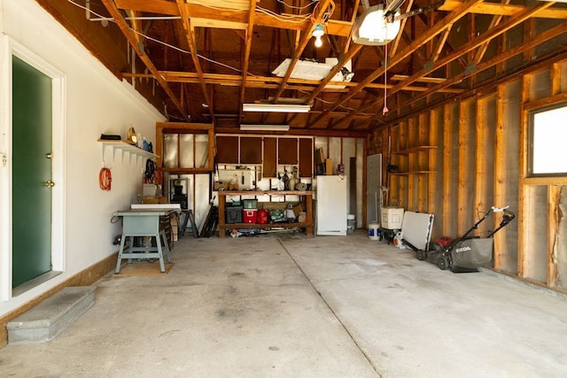 garage with freestanding refrigerator