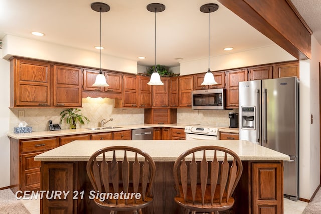 33 Ferro St, Sanford, MI 48657 - kitchen featuring appliances with stainless steel finishes, a center island, light countertops, and a sink