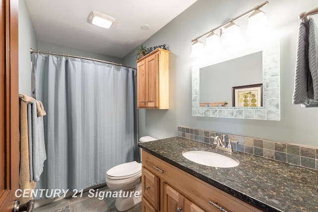 33 Ferro St, Sanford, MI 48657 - full bath with toilet, vanity, and a shower with shower curtain