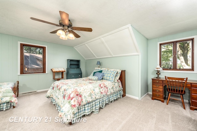 33 Ferro St, Sanford, MI 48657 - bedroom with a baseboard heating unit, a ceiling fan, carpet floors, and a textured ceiling