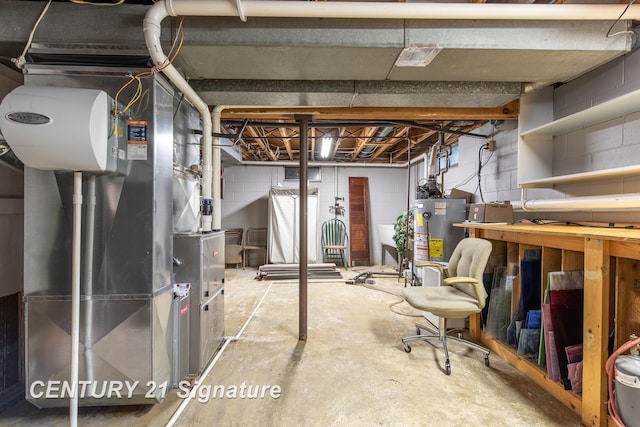 33 Ferro St, Sanford, MI 48657 - unfinished below grade area with concrete block wall and water heater