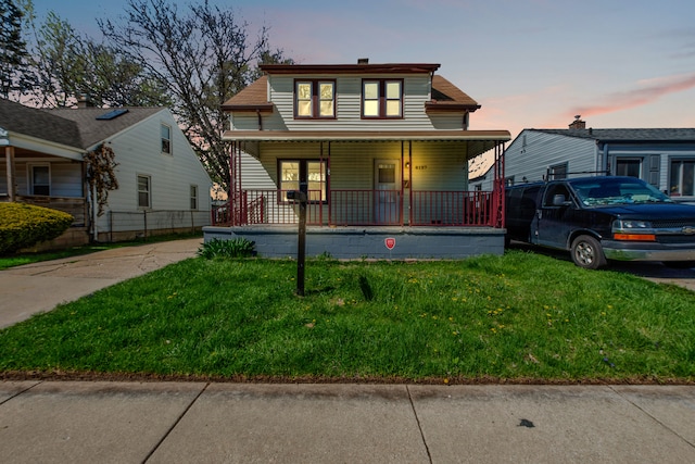 8127 Continental Ave, Warren, MI 48089 - bungalow-style home with a front yard and covered porch
