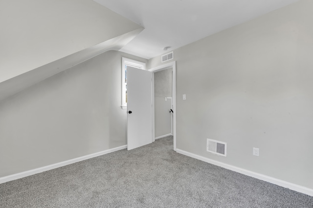 8127 Continental Ave, Warren, MI 48089 - bonus room featuring carpet flooring, visible vents, lofted ceiling, and baseboards
